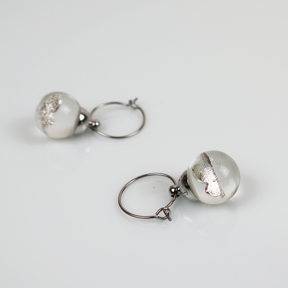 Pair of silver earrings with silver butterfly