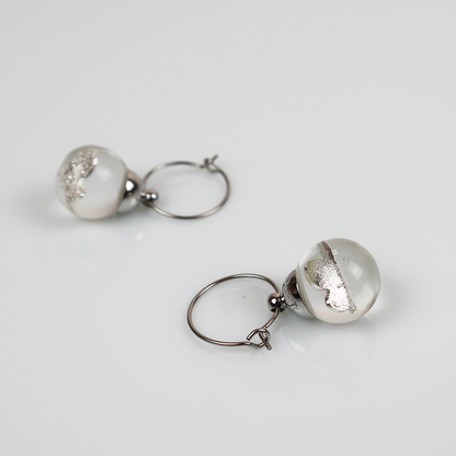 Pair of silver earrings with silver butterfly